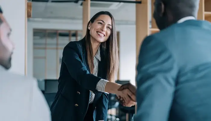 Two colleagues shaking hands